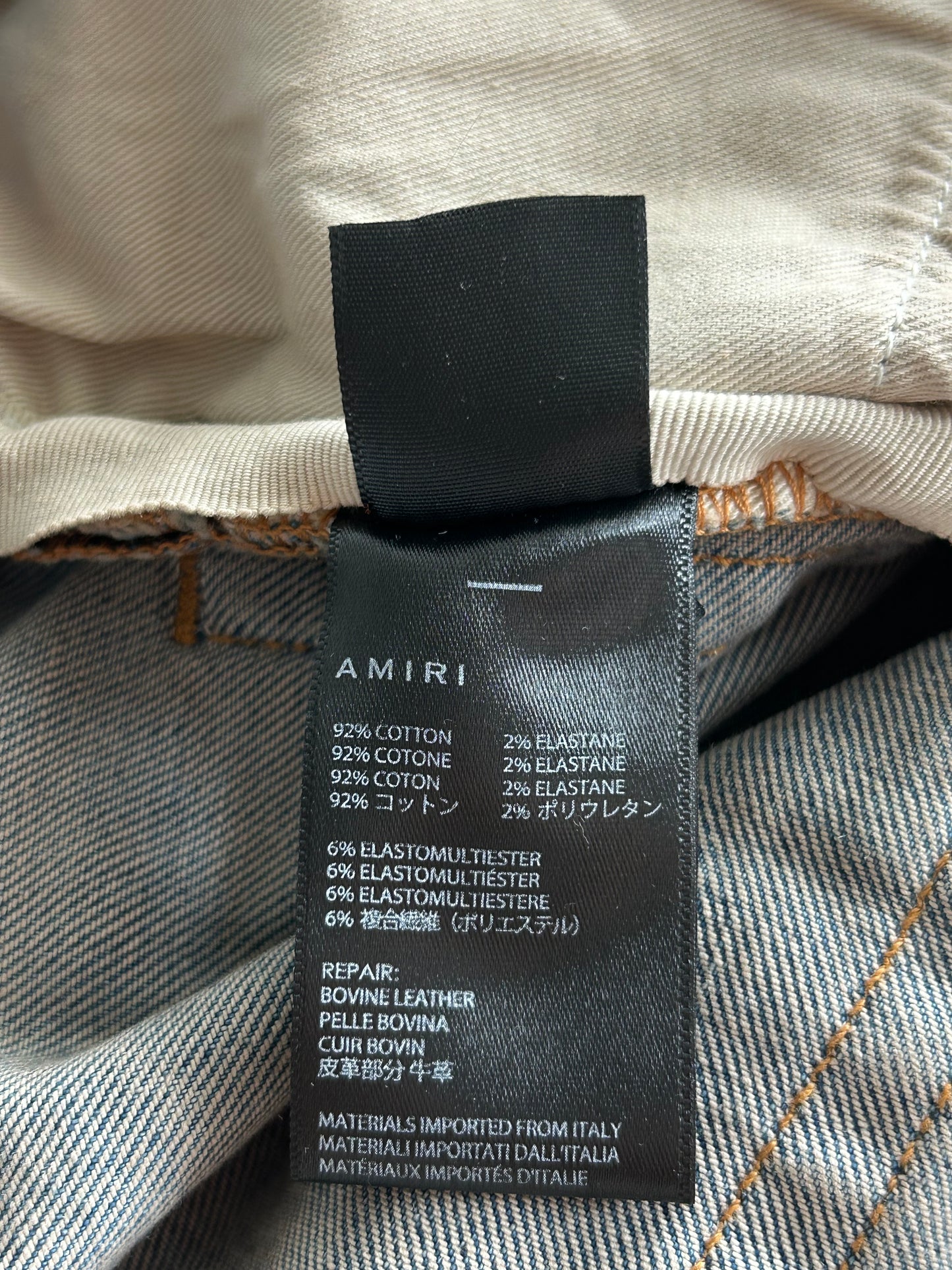 Amiri Clay Indigo Leopard Patch Thrasher Jeans