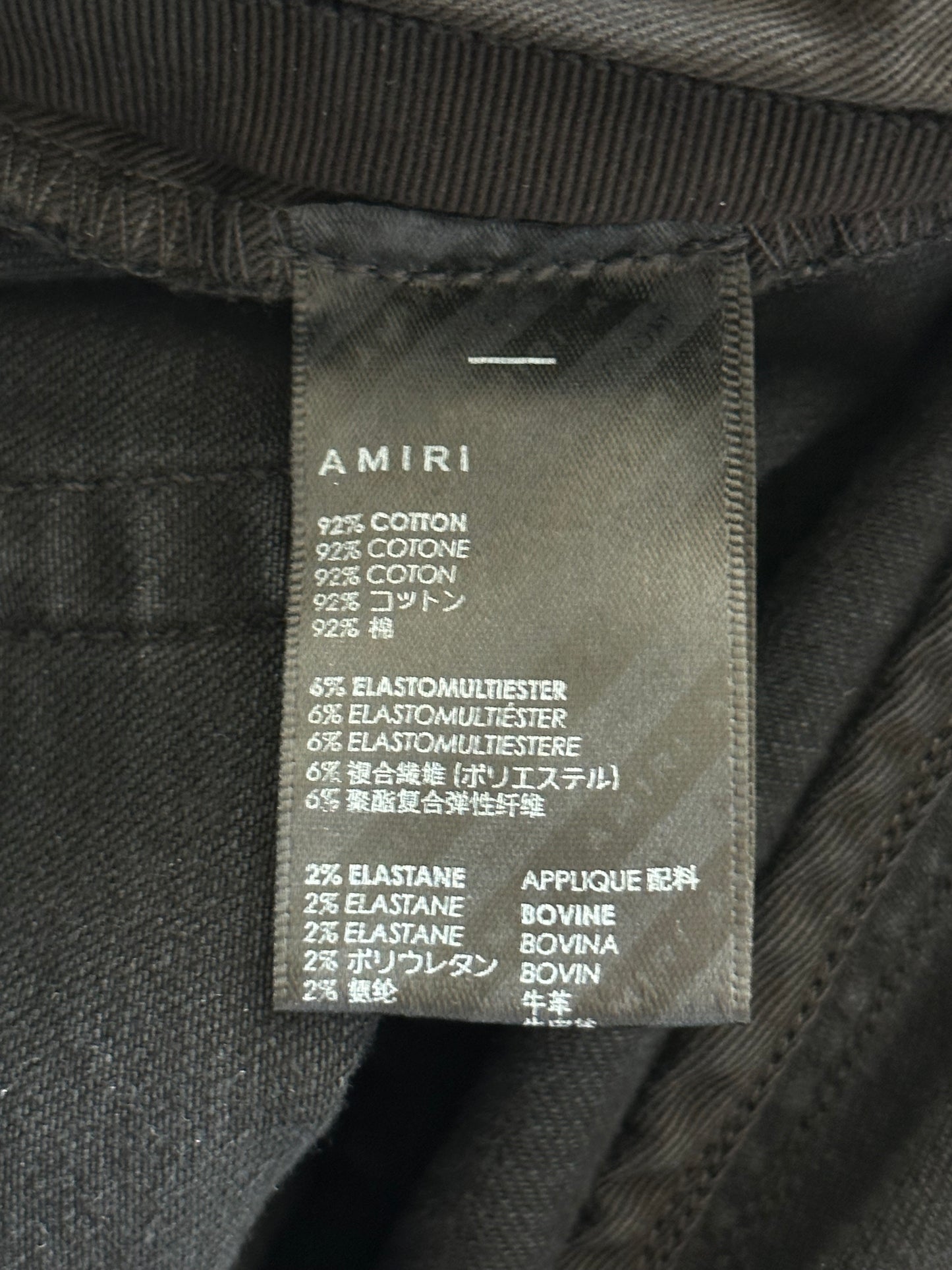 Amiri Aged Black White & Red Bones Applique Distressed Jeans