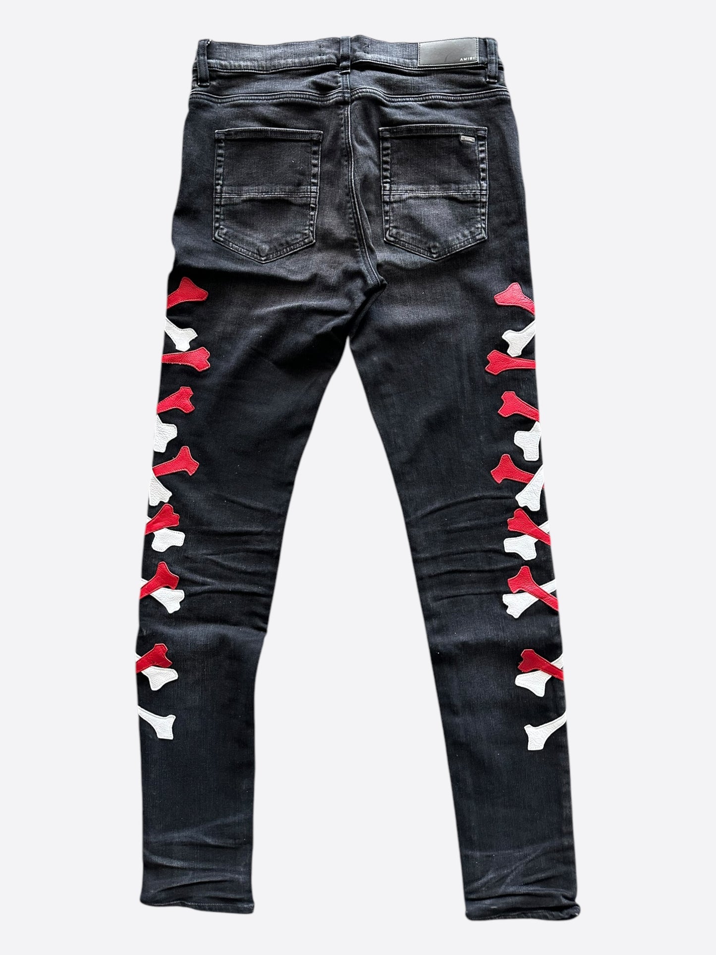 Amiri Aged Black White & Red Bones Applique Distressed Jeans