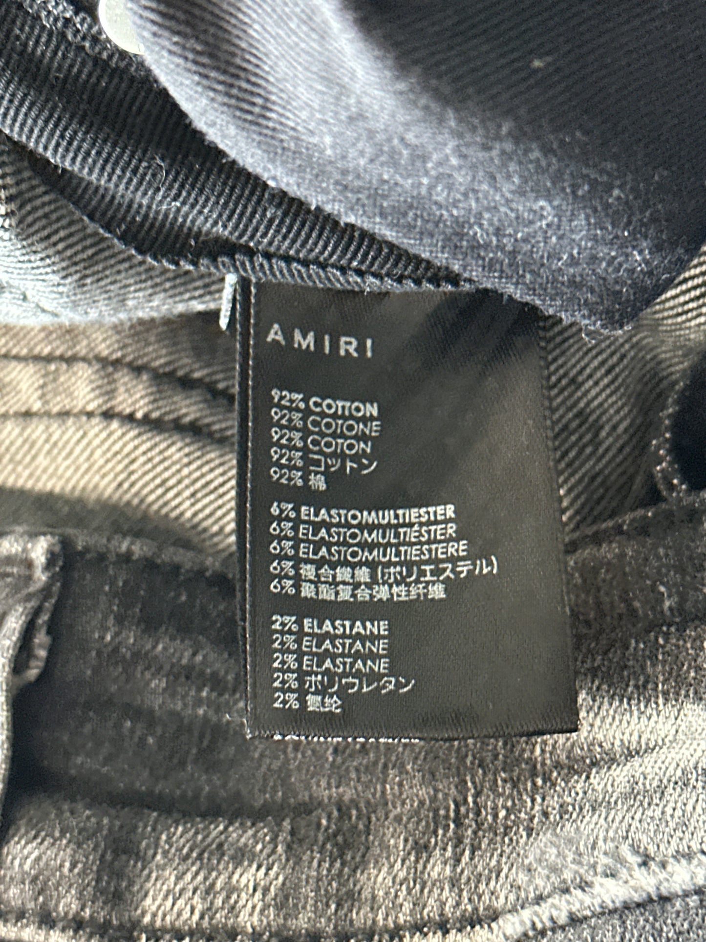 Amiri Storm Grey Distressed Staggered Logo Jeans