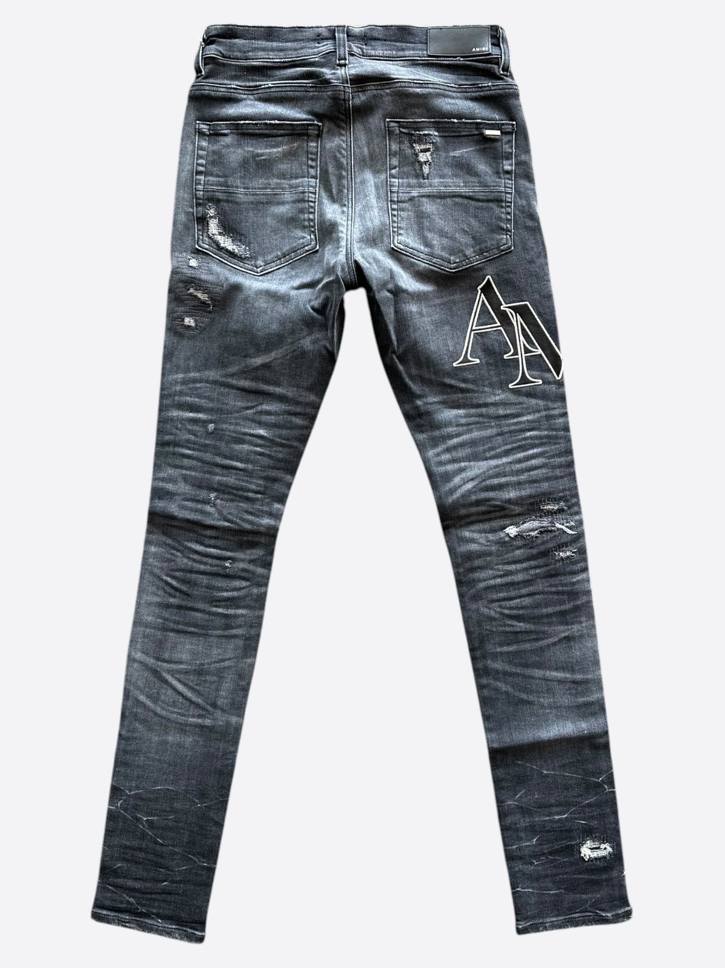 Amiri Storm Grey Distressed Staggered Logo Jeans
