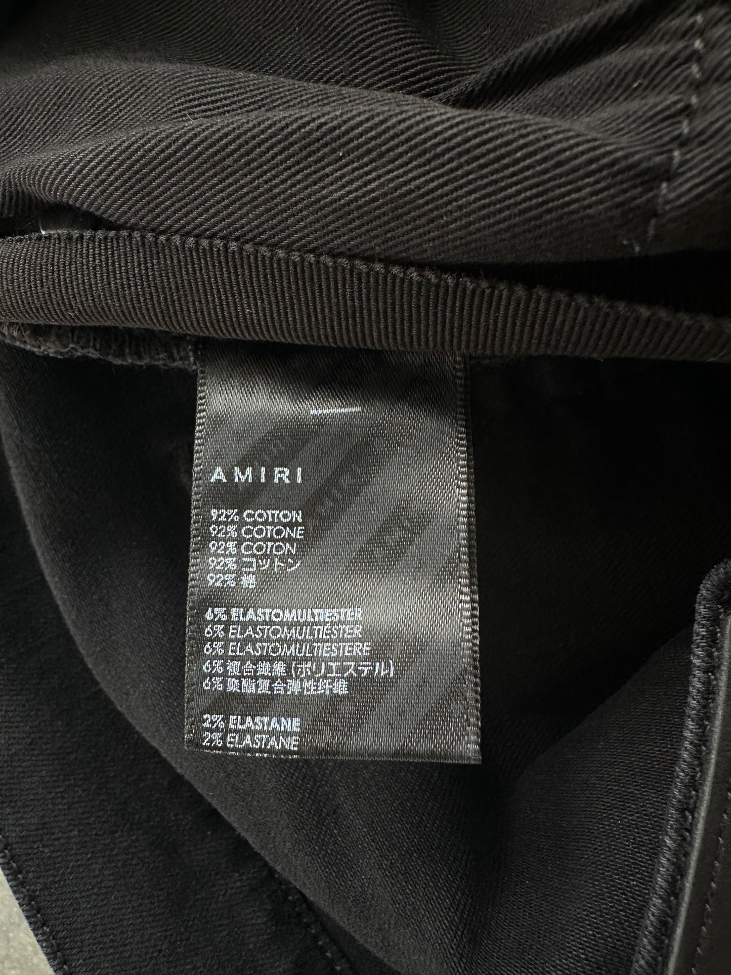 Amiri Aged Black & Red Patch MX1 Jeans