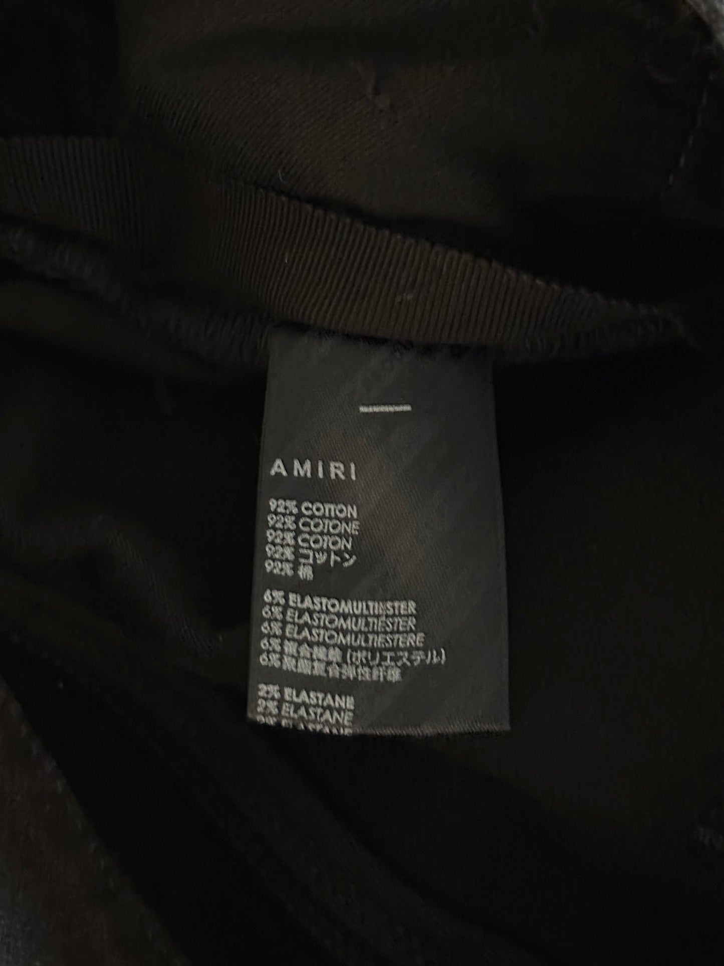 Amiri Black Distressed Thrasher Jeans