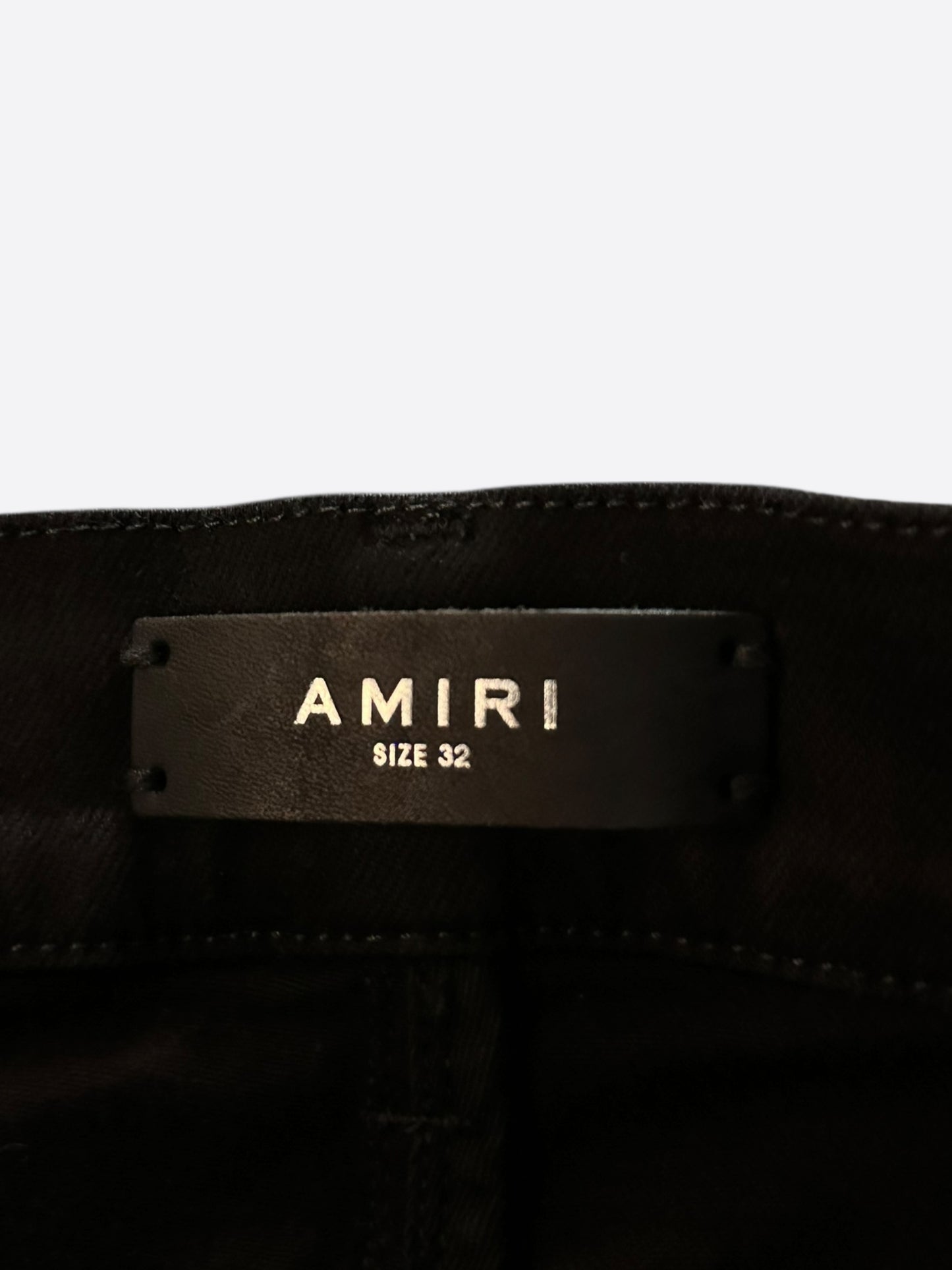 Amiri Black Distressed Thrasher Jeans