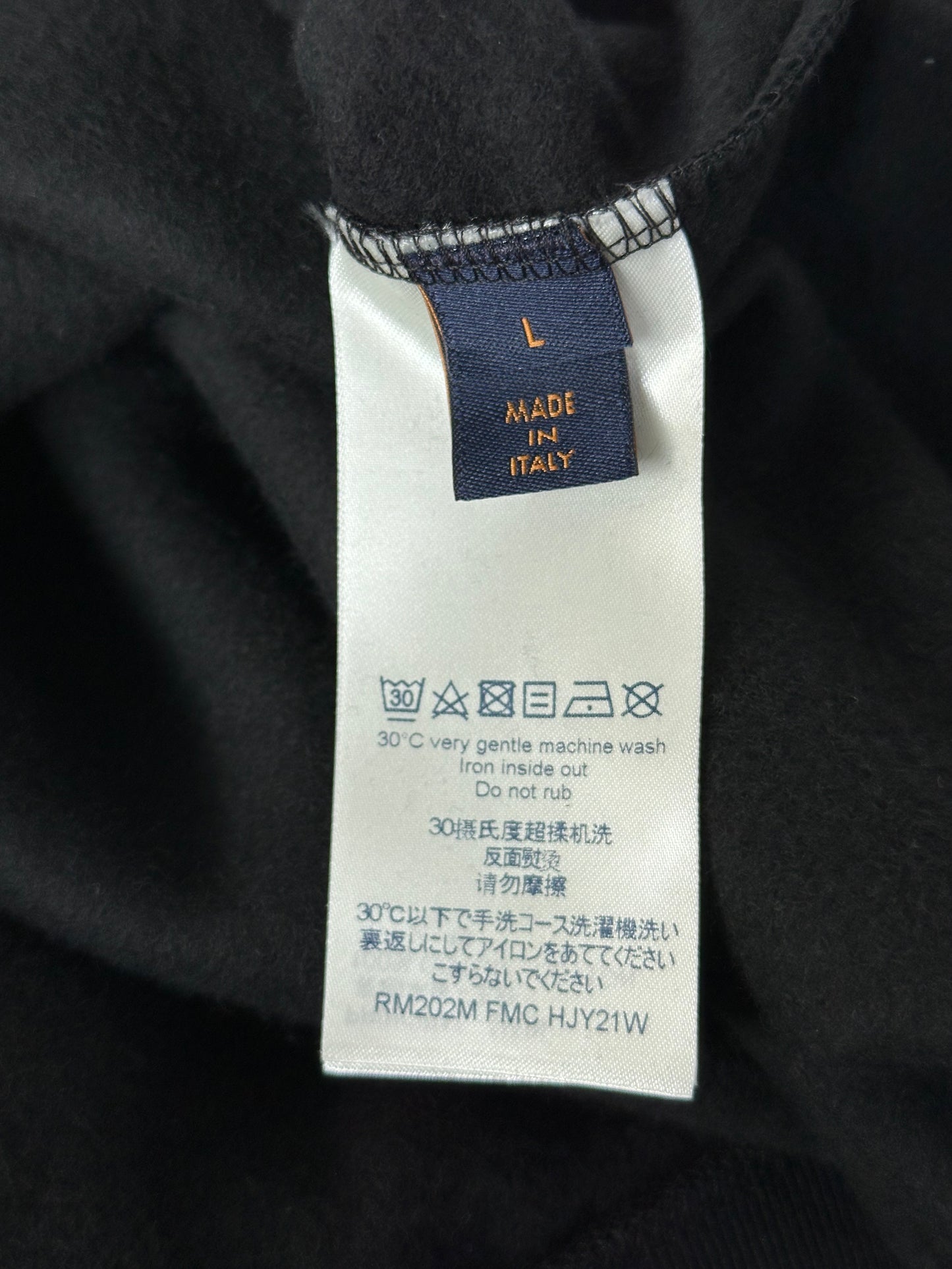 Louis Vuitton Black & White LV Stitch Logo Sweater