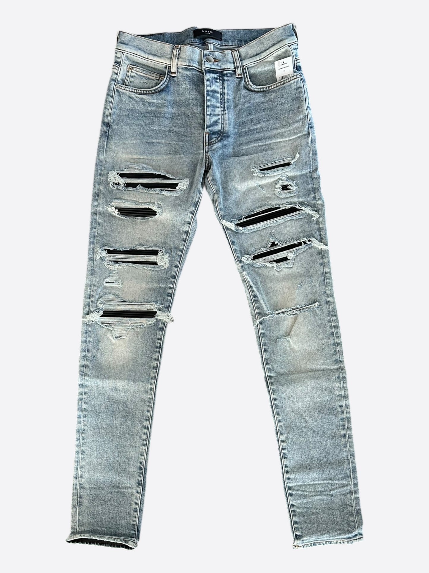Amiri Stone Indigo Black Leather Patch Thrasher Jeans