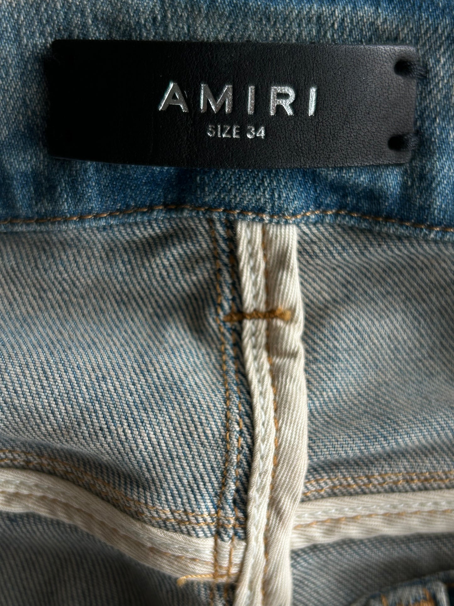 Amiri Clay Indigo Leopard Patch Thrasher Jeans