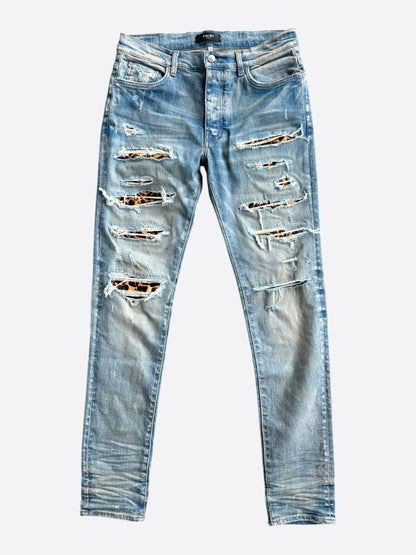 Amiri Clay Indigo Leopard Patch Thrasher Jeans