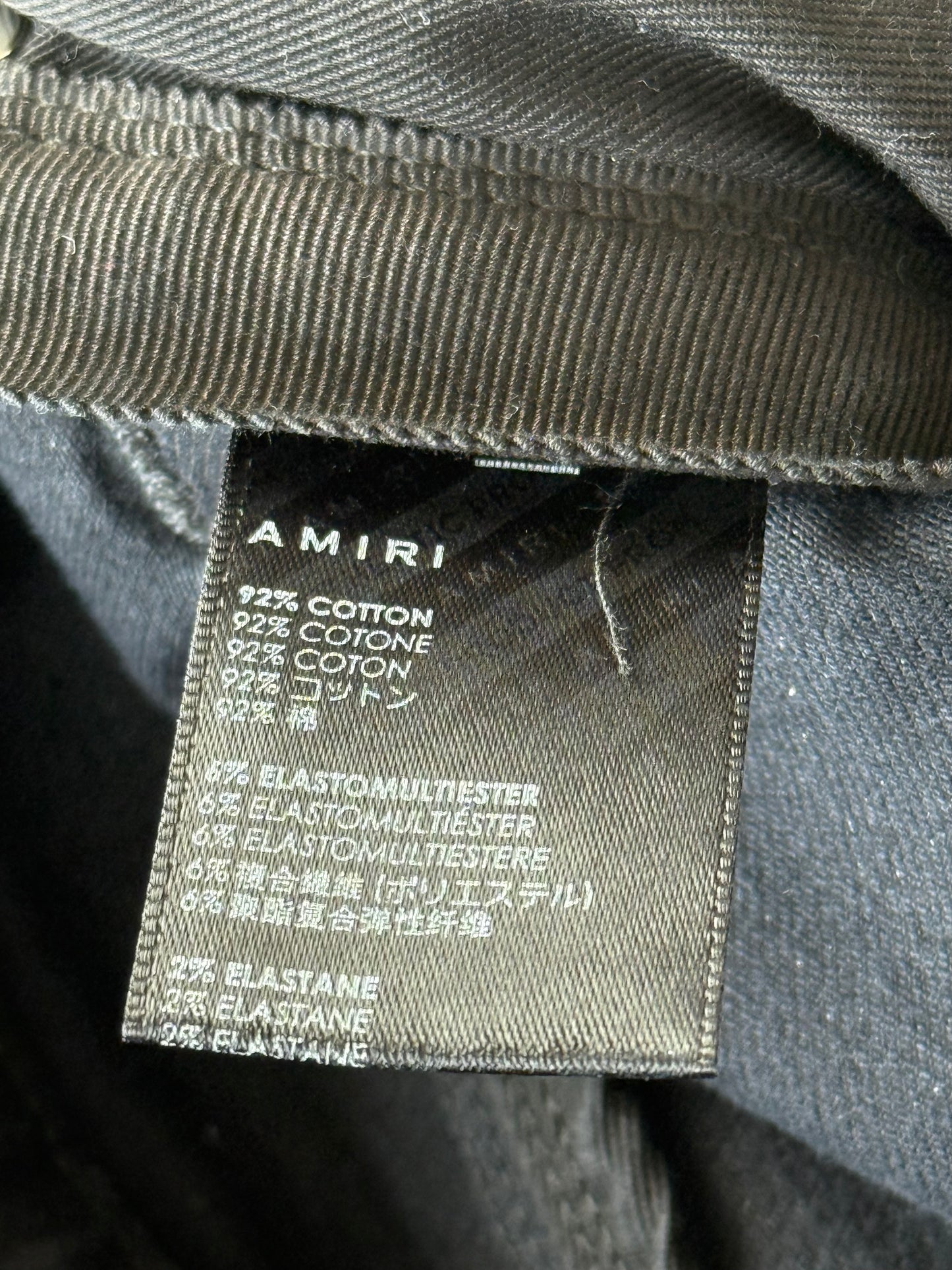 Amiri Aged Black Plaid Patch Thrasher Jeans