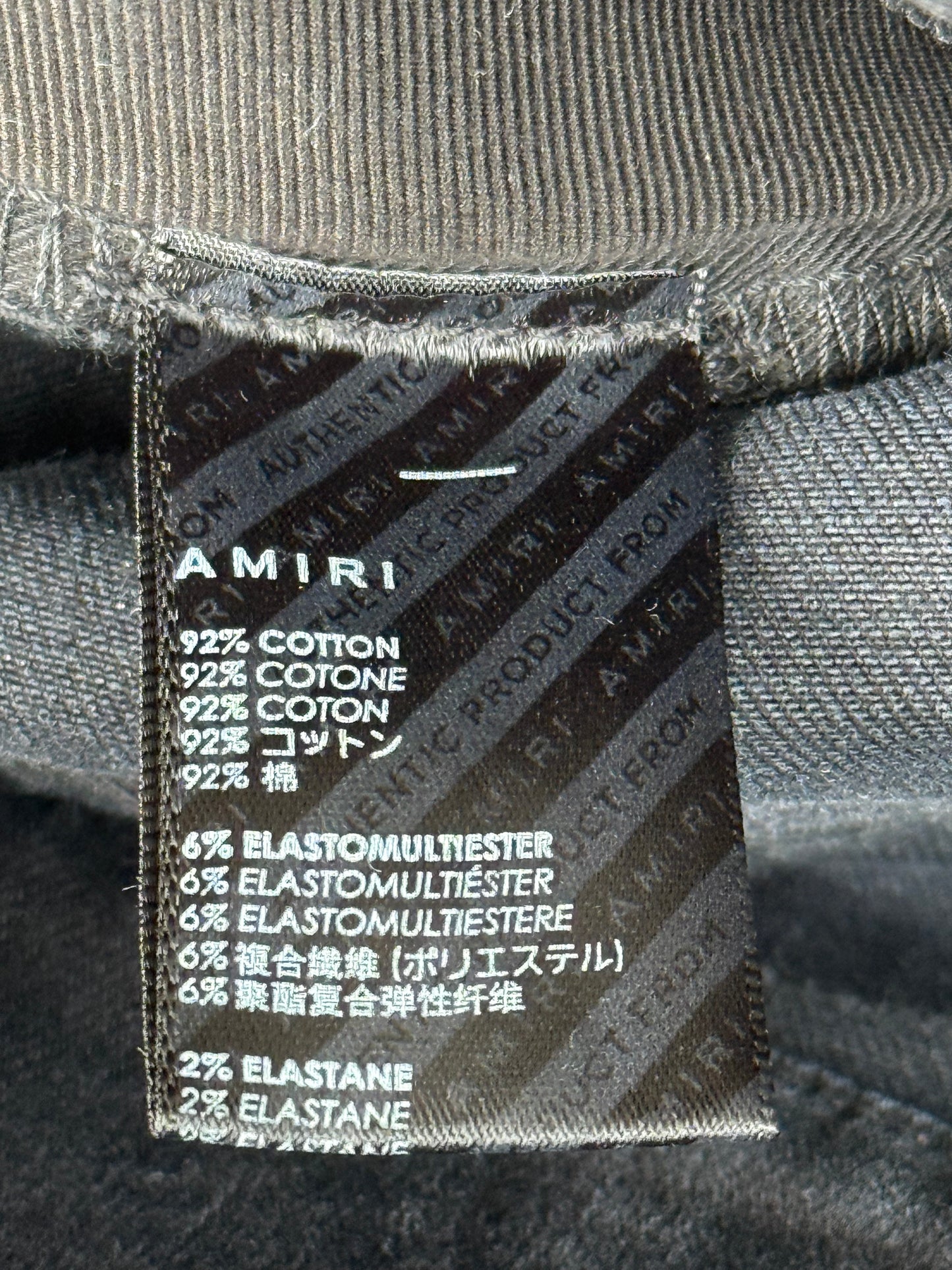 Amiri Aged Black Tie-Dye Patch Thrasher Jeans