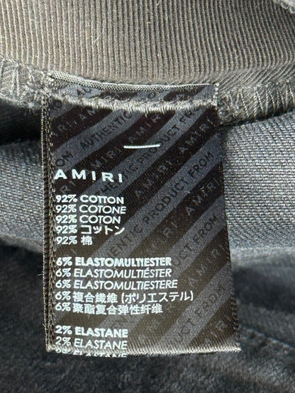 Amiri Aged Black Tie-Dye Patch Thrasher Jeans