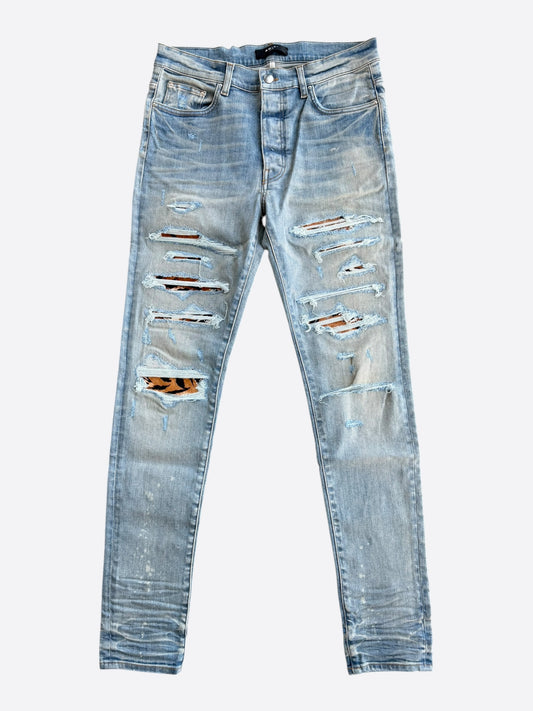 Amiri Clay Indigo & Tiger Patch Thrasher Jeans