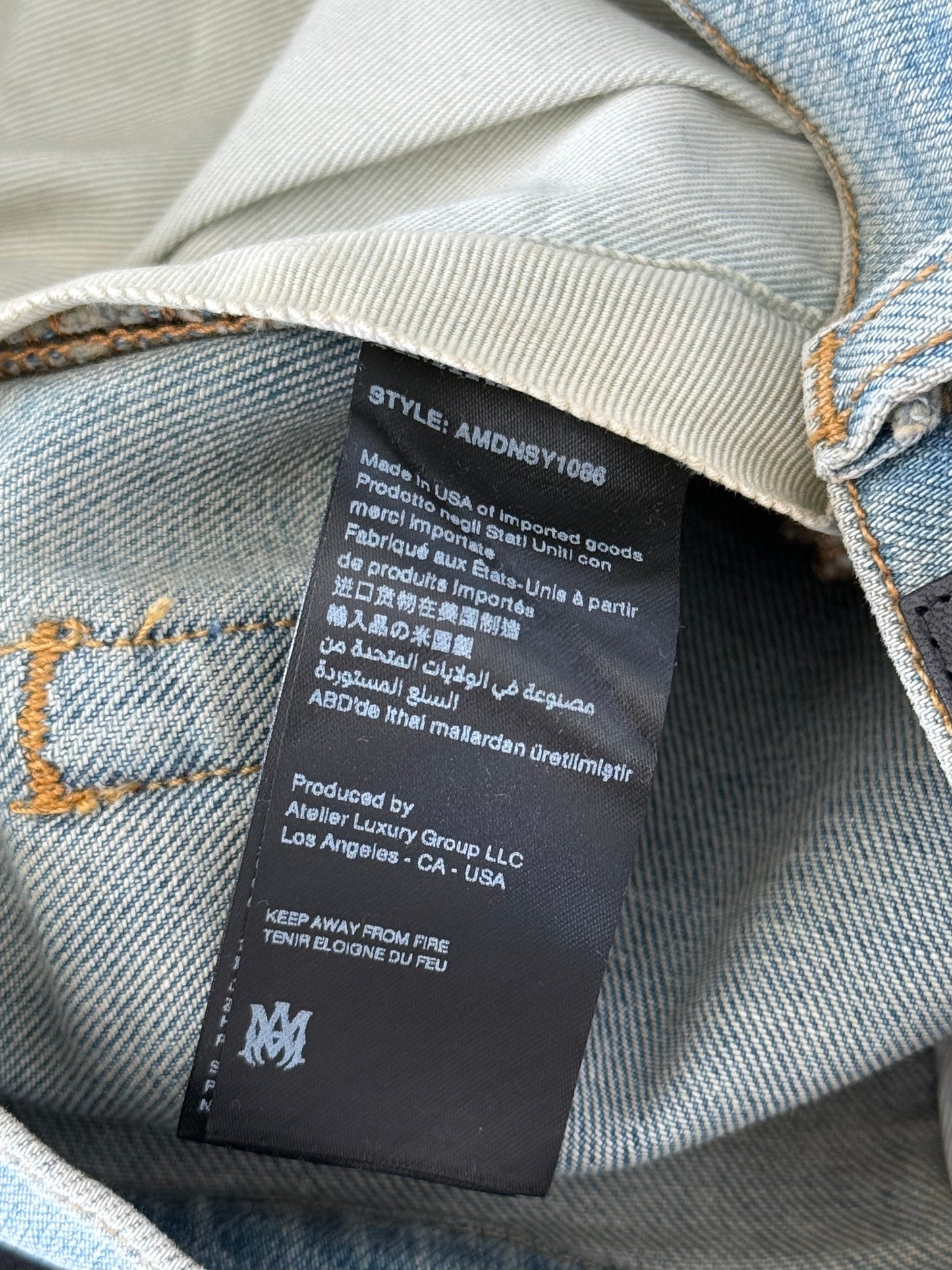 Amiri Clay Indigo & White Script Applique Logo Jeans