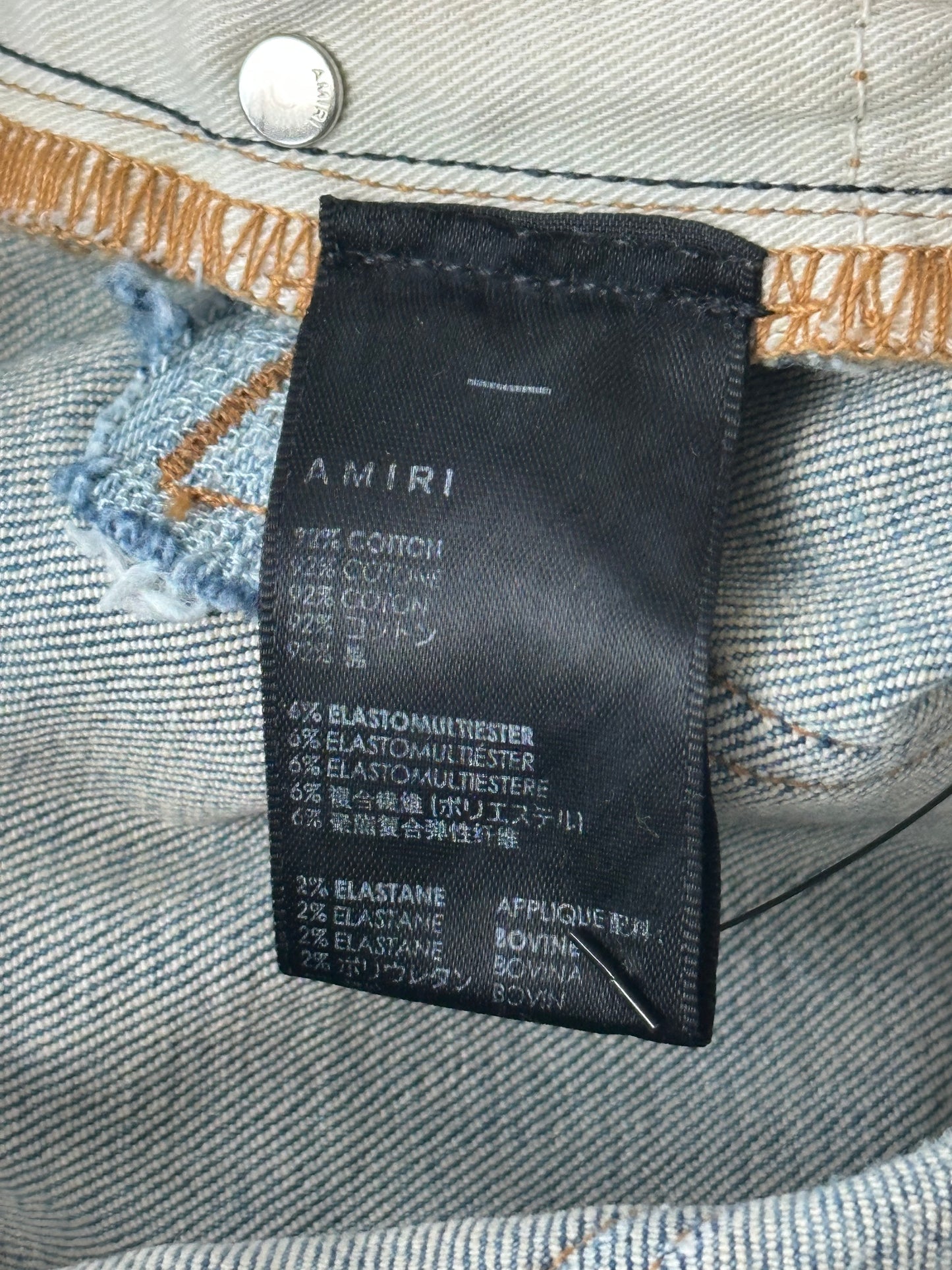 Amiri Light Indigo & White Patch Paint Splatter MX1 Jeans