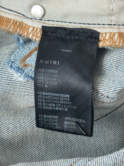 Amiri Light Indigo & White Patch Paint Splatter MX1 Jeans