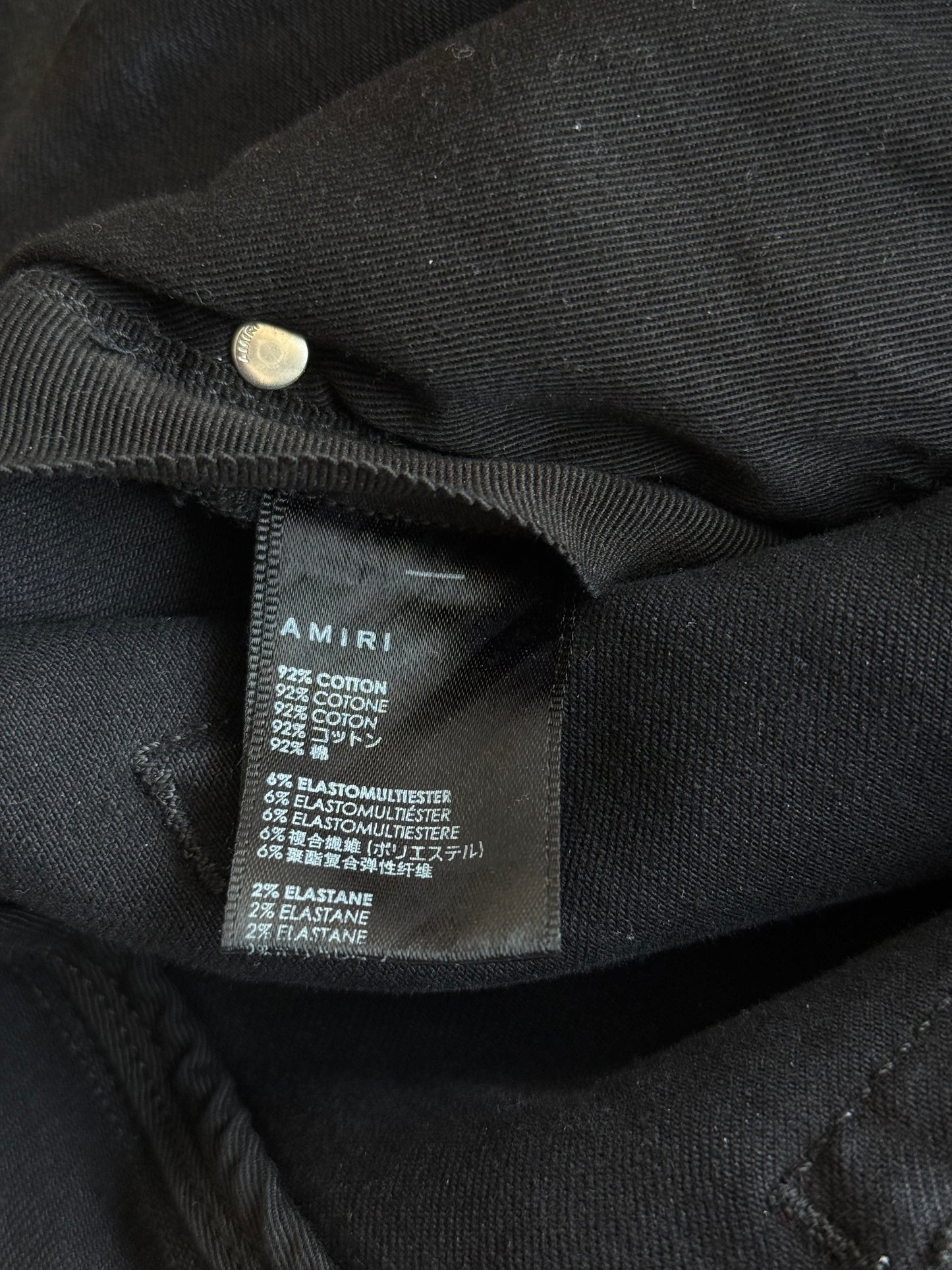 Amiri Faded Black & White Varsity Applique Distressed Jeans