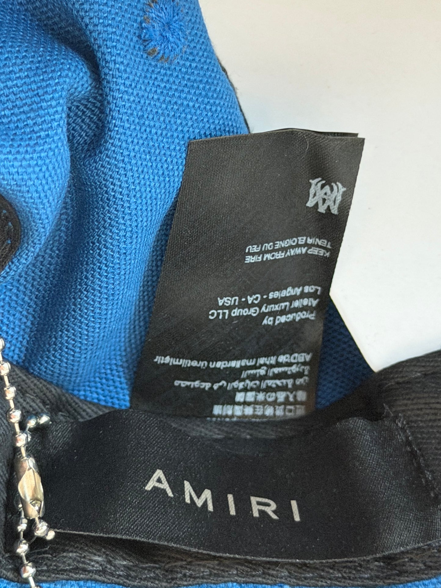 Amiri Blue & White MA Logo Trucker Hat