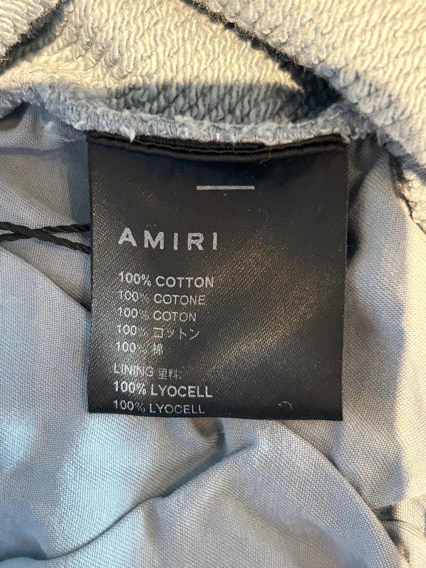 Amiri Faded Blue & White Filigree Logo Shorts