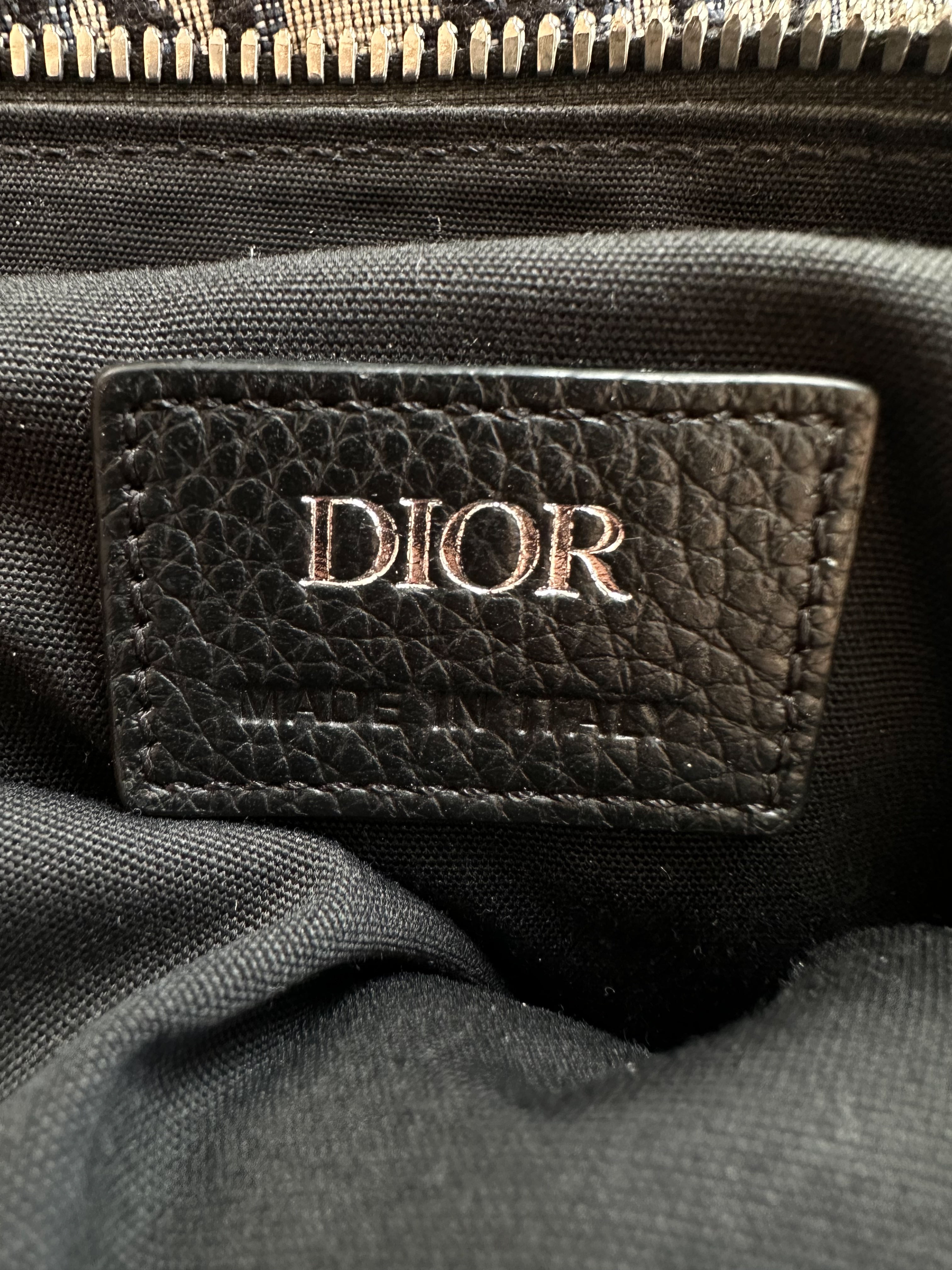 Dior saddle best sale bag serial number