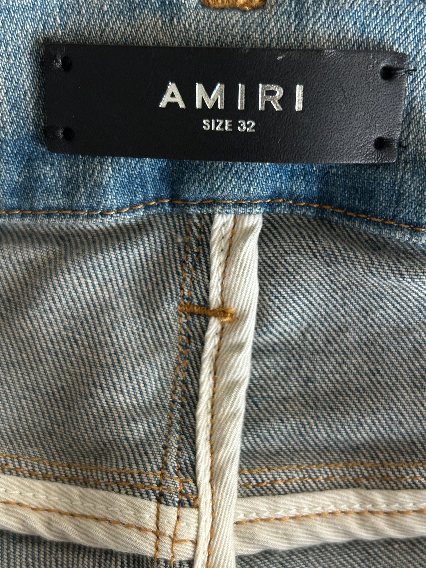 Amiri Clay Indigo Broken Distressed Jeans