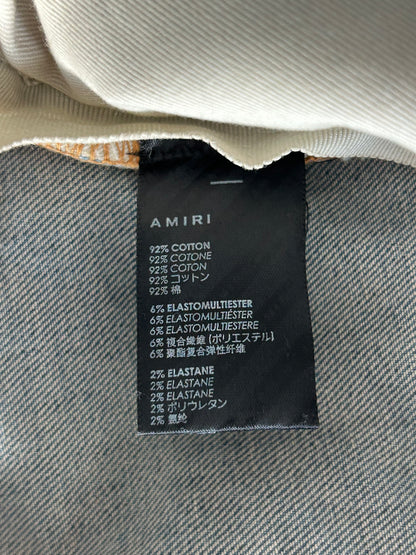 Amiri Clay Indigo Broken Distressed Jeans