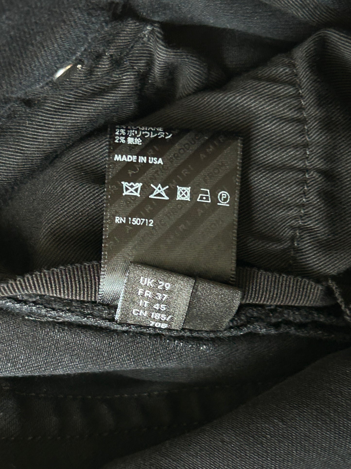 Amiri Faded Black & Green Plaid Patch MX1 Jeans
