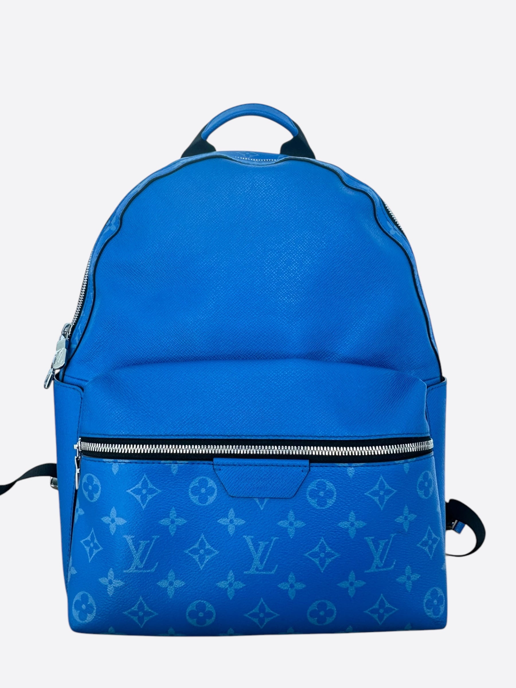 louis vuitton backpack blue zipper Discovery Leather GM Crafted from monogram pigment coated canvas with colored leather trim LOUIS VUITTON Christopher Backpack Denim