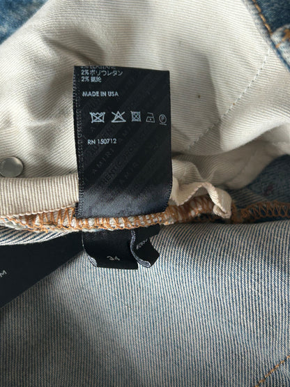 Amiri Clay Indigo Distressed Repair Logo Thrasher Jeans