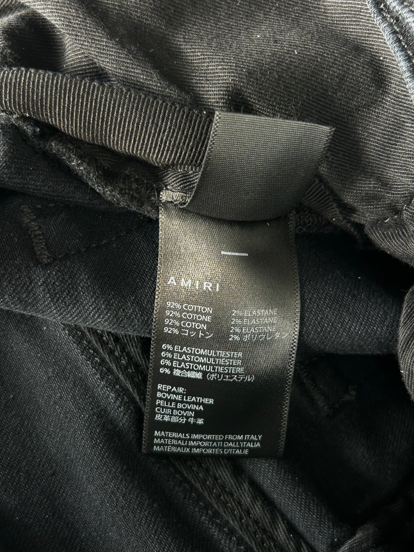 Amiri Aged Black Leopard Patch Thrasher Jeans