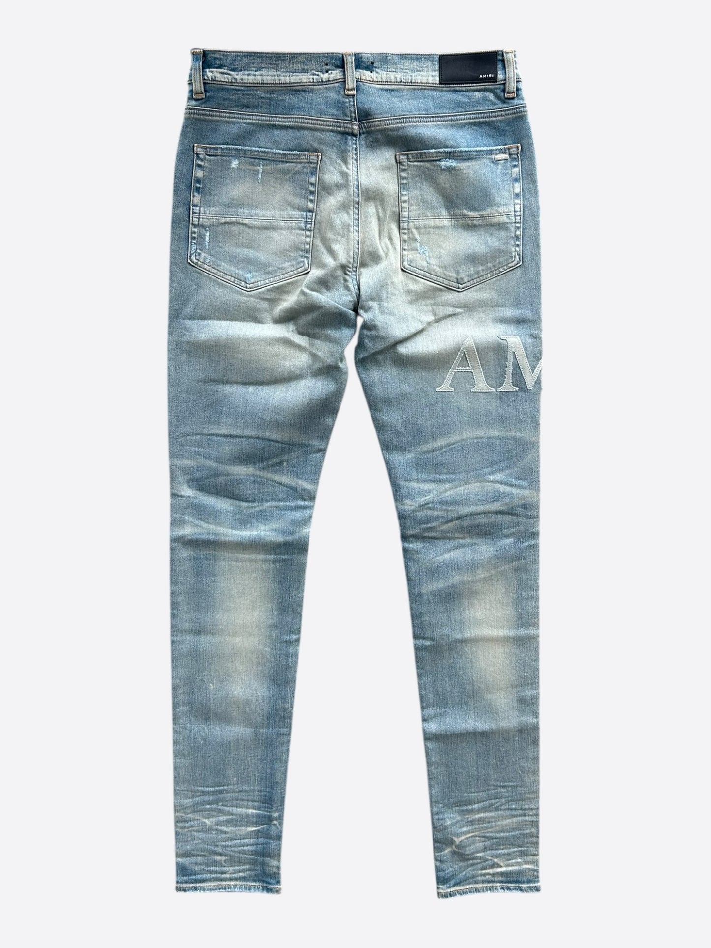 Amiri Clay Indigo Distressed Repair Logo Thrasher Jeans