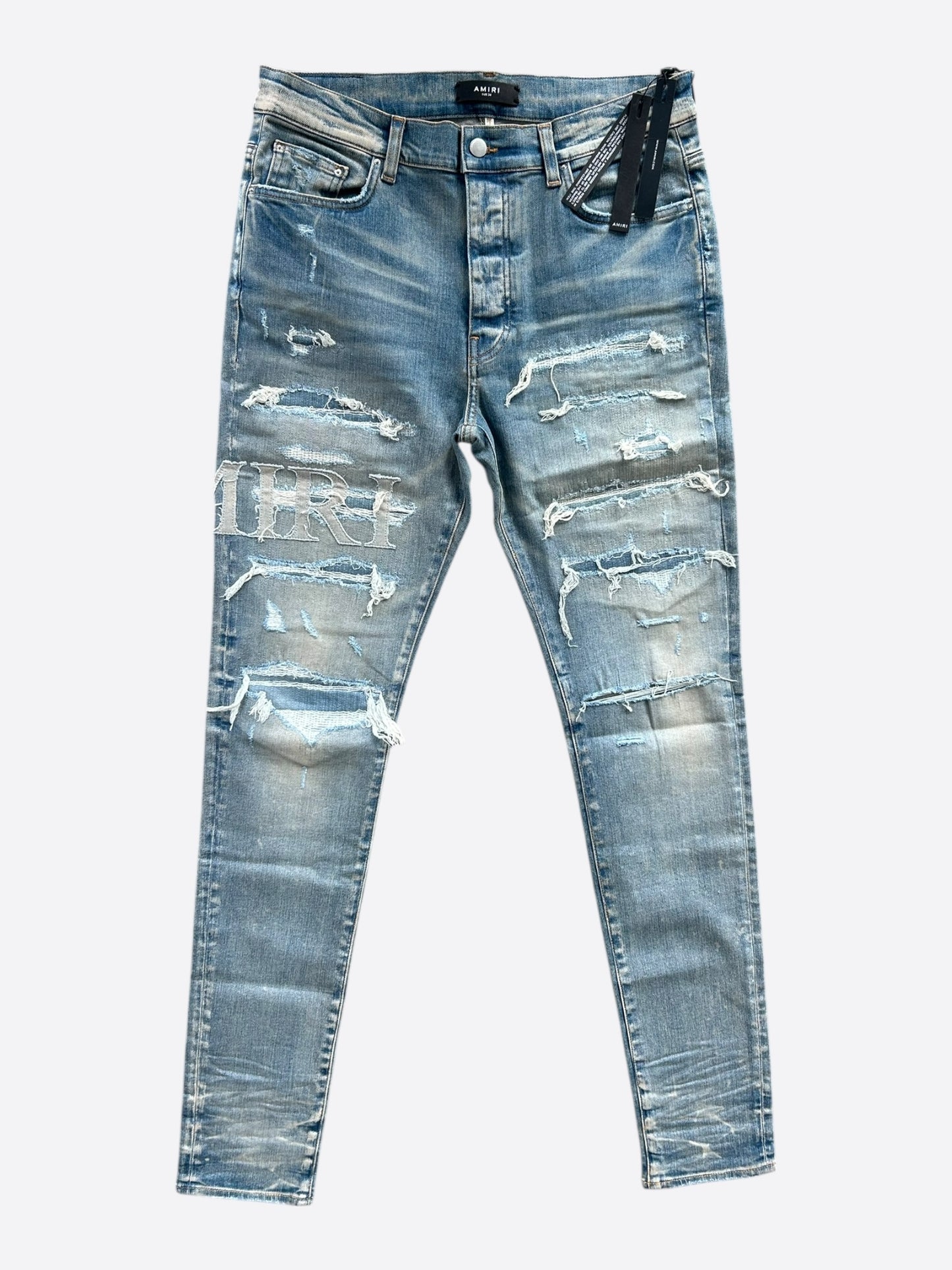 Amiri Clay Indigo Distressed Repair Logo Thrasher Jeans