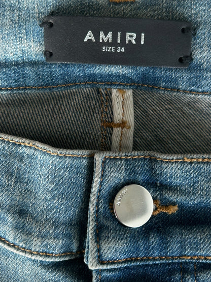 Amiri Clay Indigo Distressed Repair Logo Thrasher Jeans