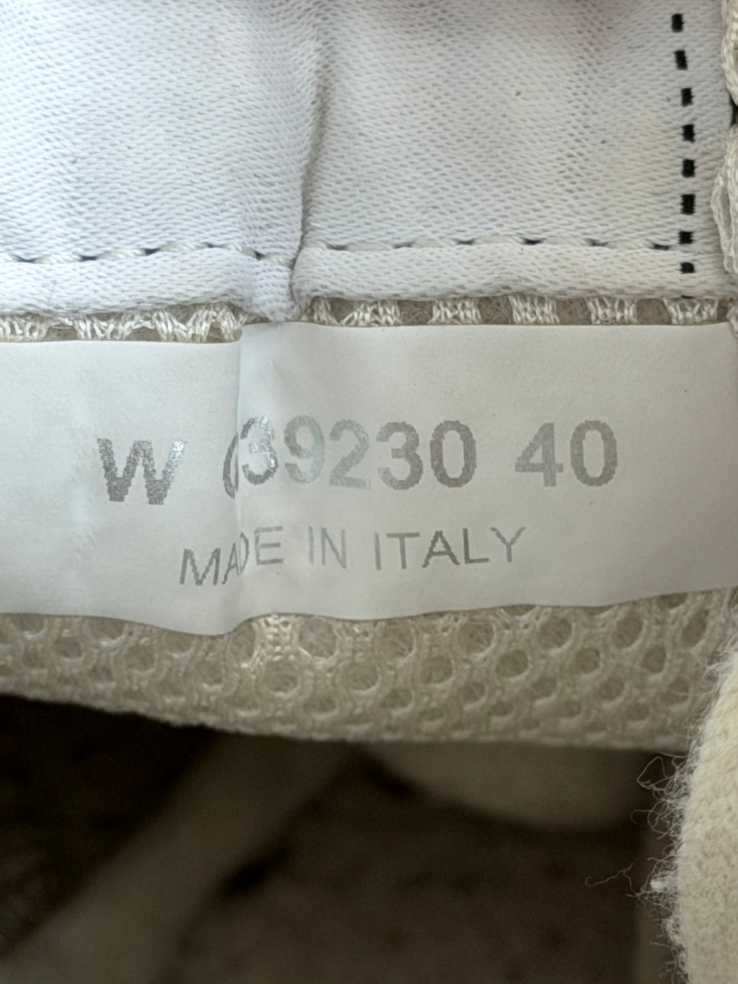 Chanel Black & White Embossed CC Logo Sneakers