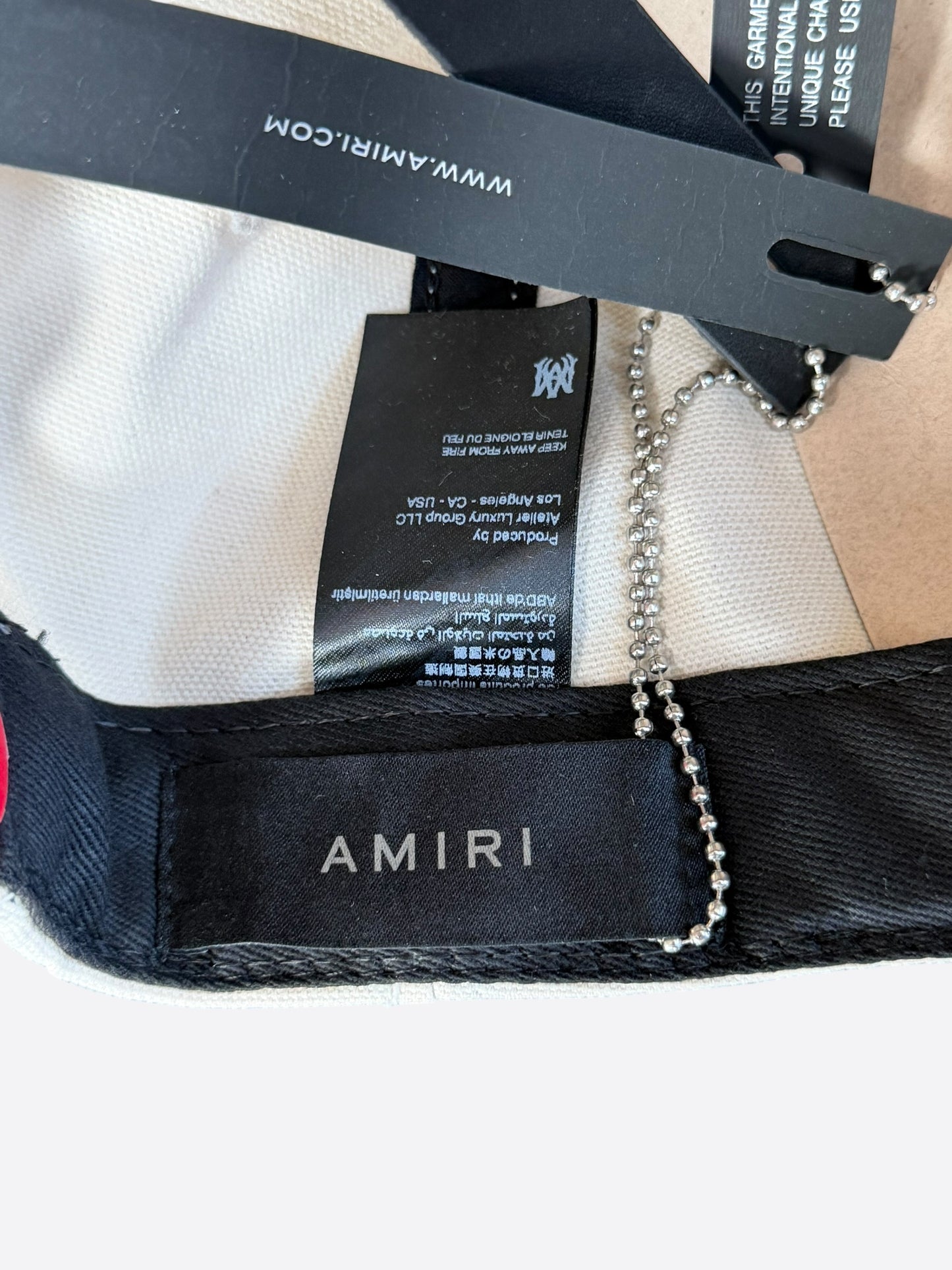 Amiri White & Red MA Logo Trucker Hat