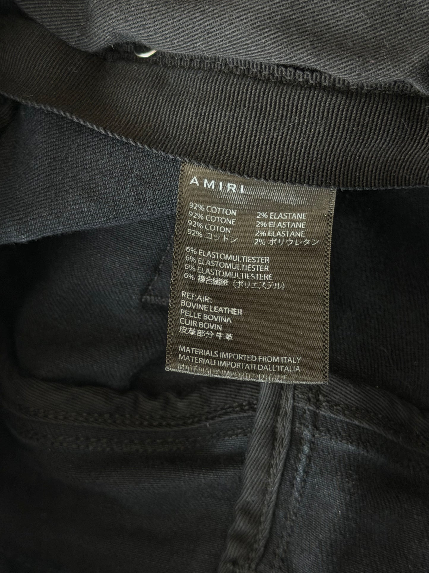 Amiri Aged Black & Cracked Pink Patch MX1 Jeans