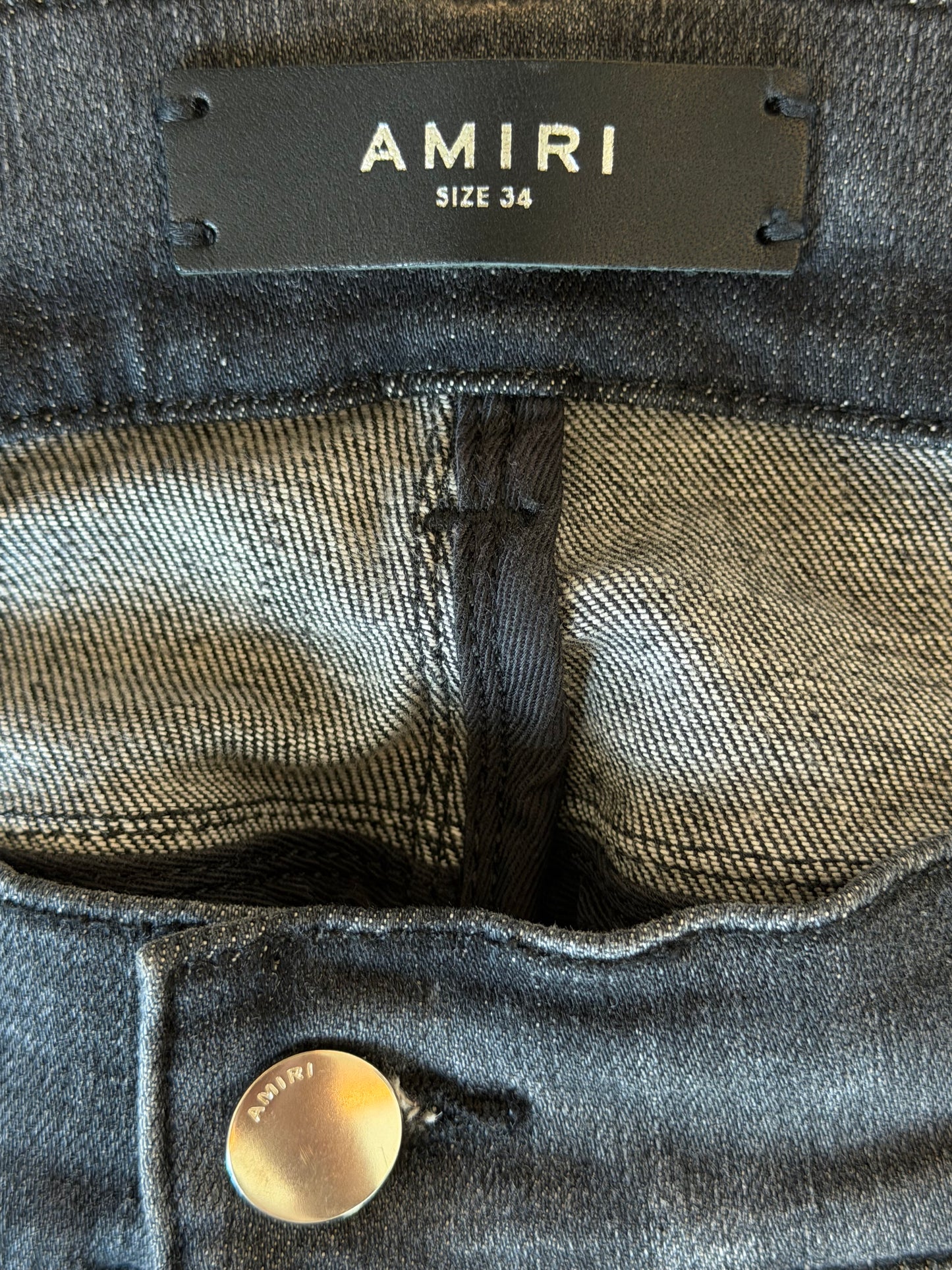 Amiri Storm Grey Staggered Logo Jeans