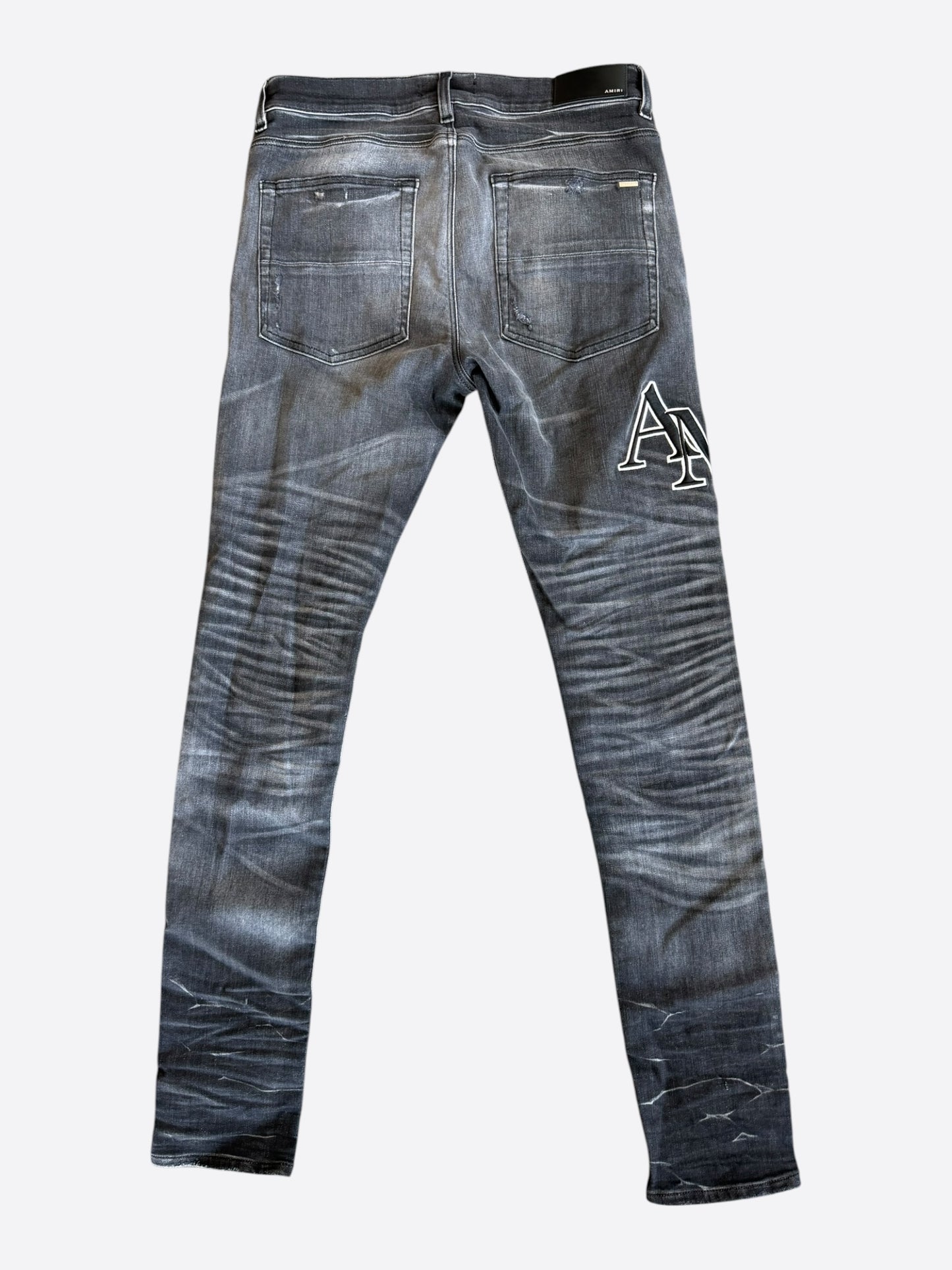 Amiri Storm Grey Staggered Logo Jeans