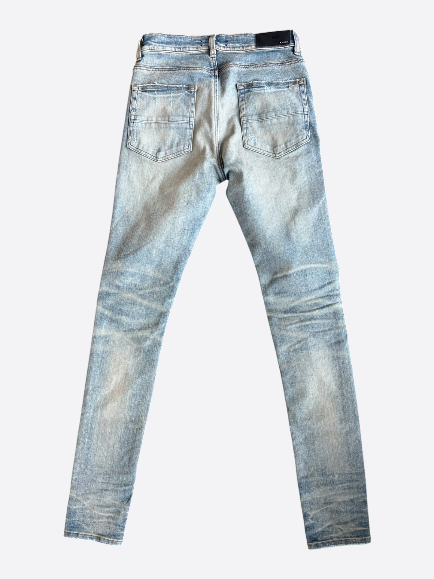 Amiri Clay Indigo & Cracked Pink Patch MX1 Jeans