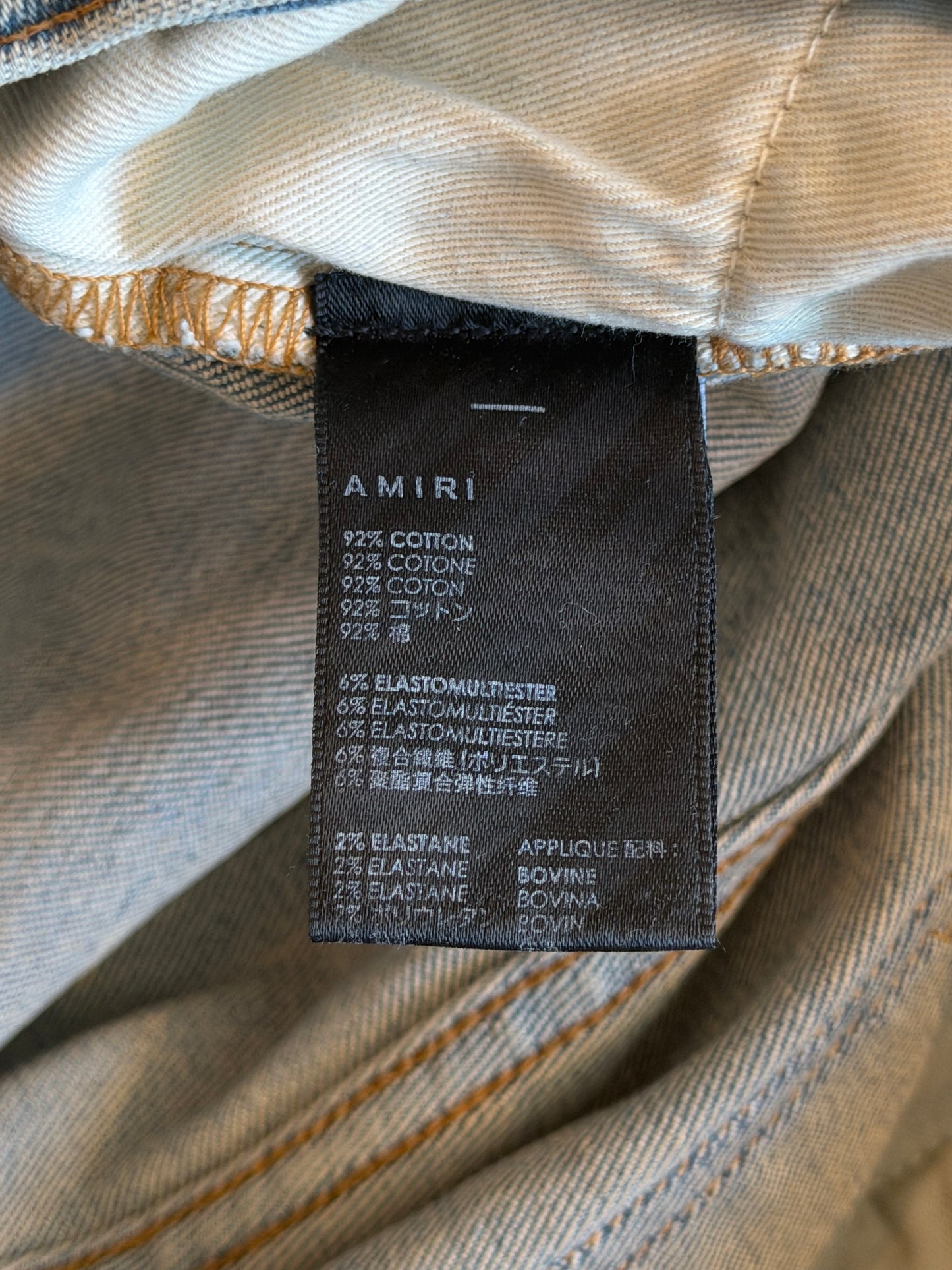 Amiri Light Indigo & White Patch Paint Splatter MX1 Jeans