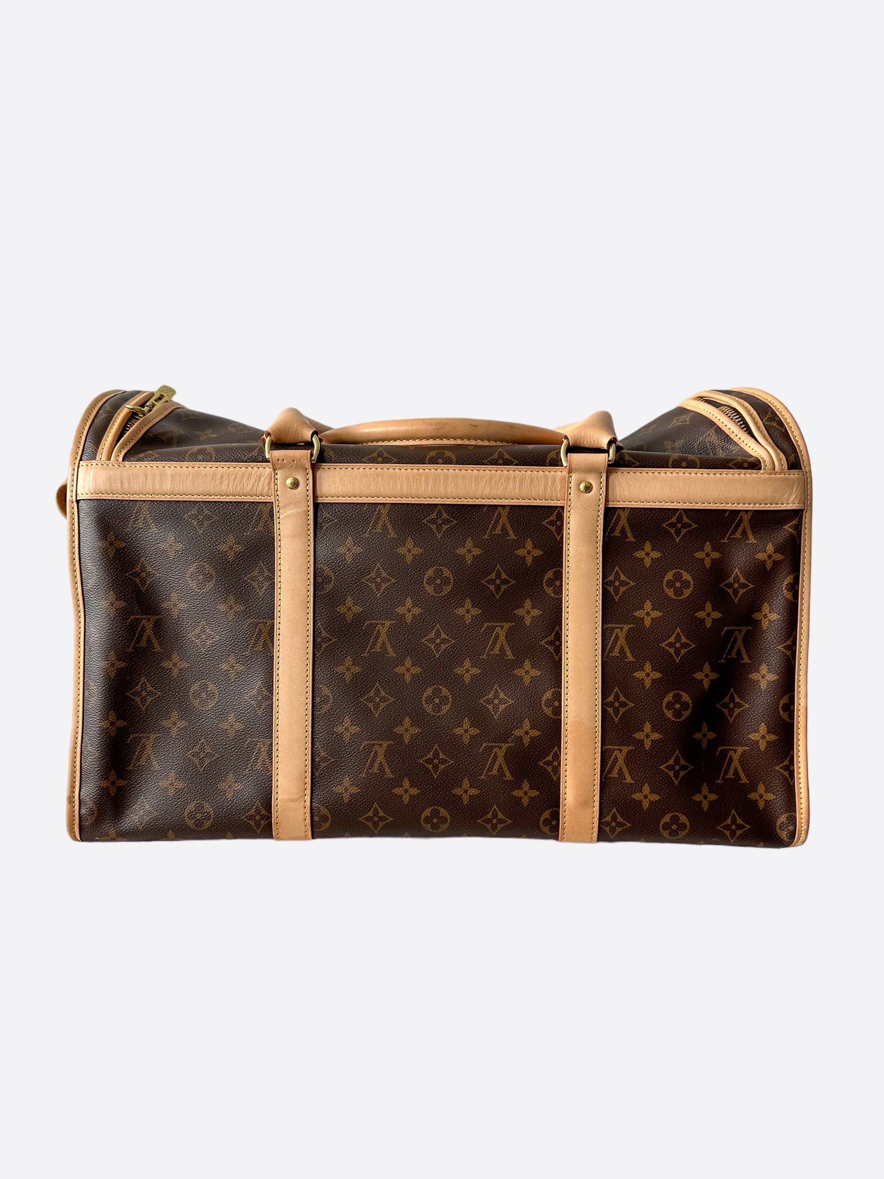 Louis Vuitton Sac chien 40 travel bag in brown monogram canvas and natural  leather, Cross Body Bags 5
