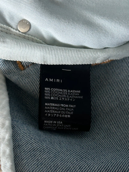 Amiri Clay Indigo White Patch Thrasher Jeans
