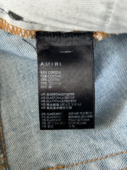 Amiri Light Indigo & Black Patch MX1 Jeans