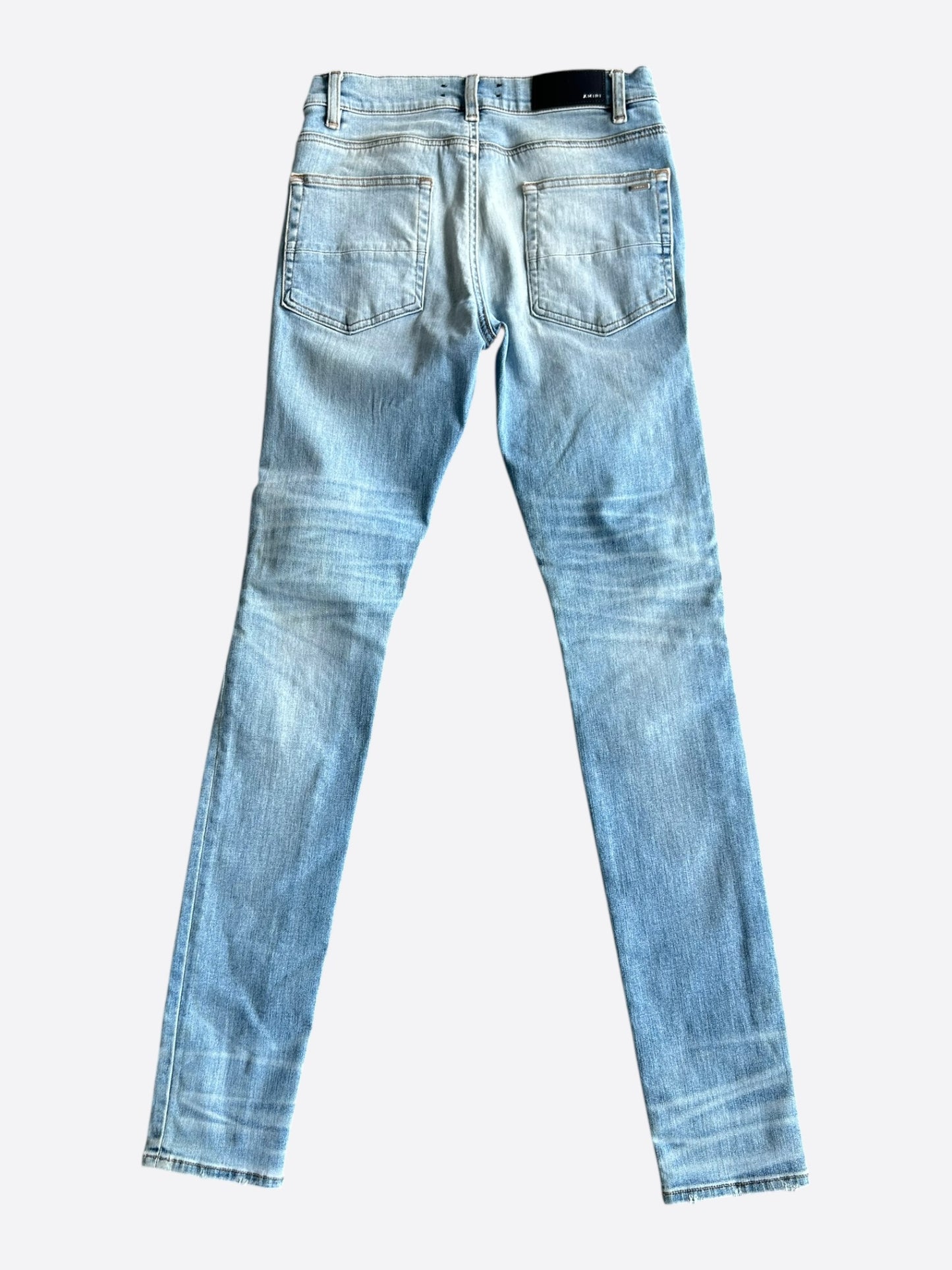 Amiri Clay Indigo White Patch Thrasher Jeans