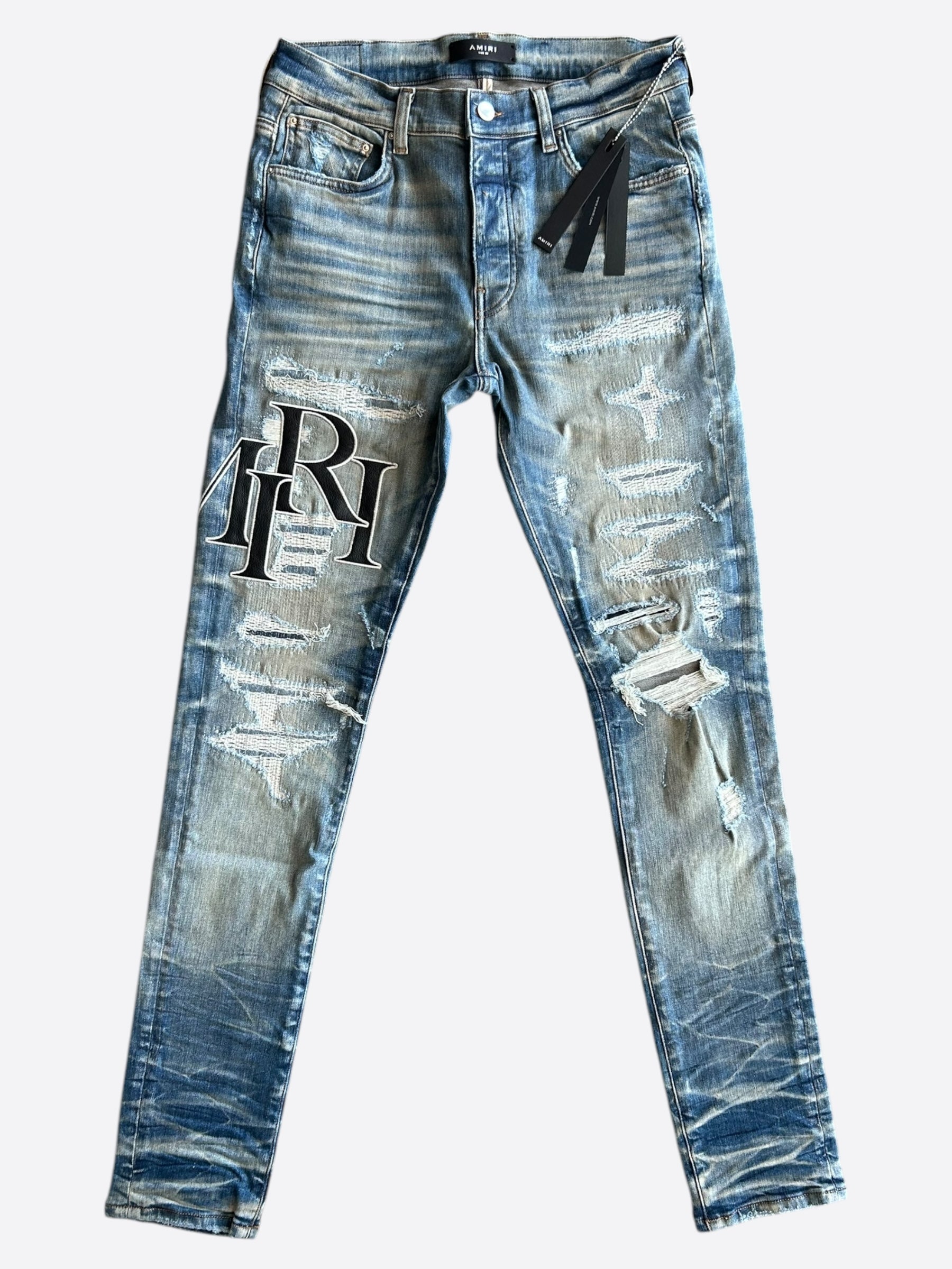Amiri Vintage Indigo Staggered Logo Jeans – Savonches