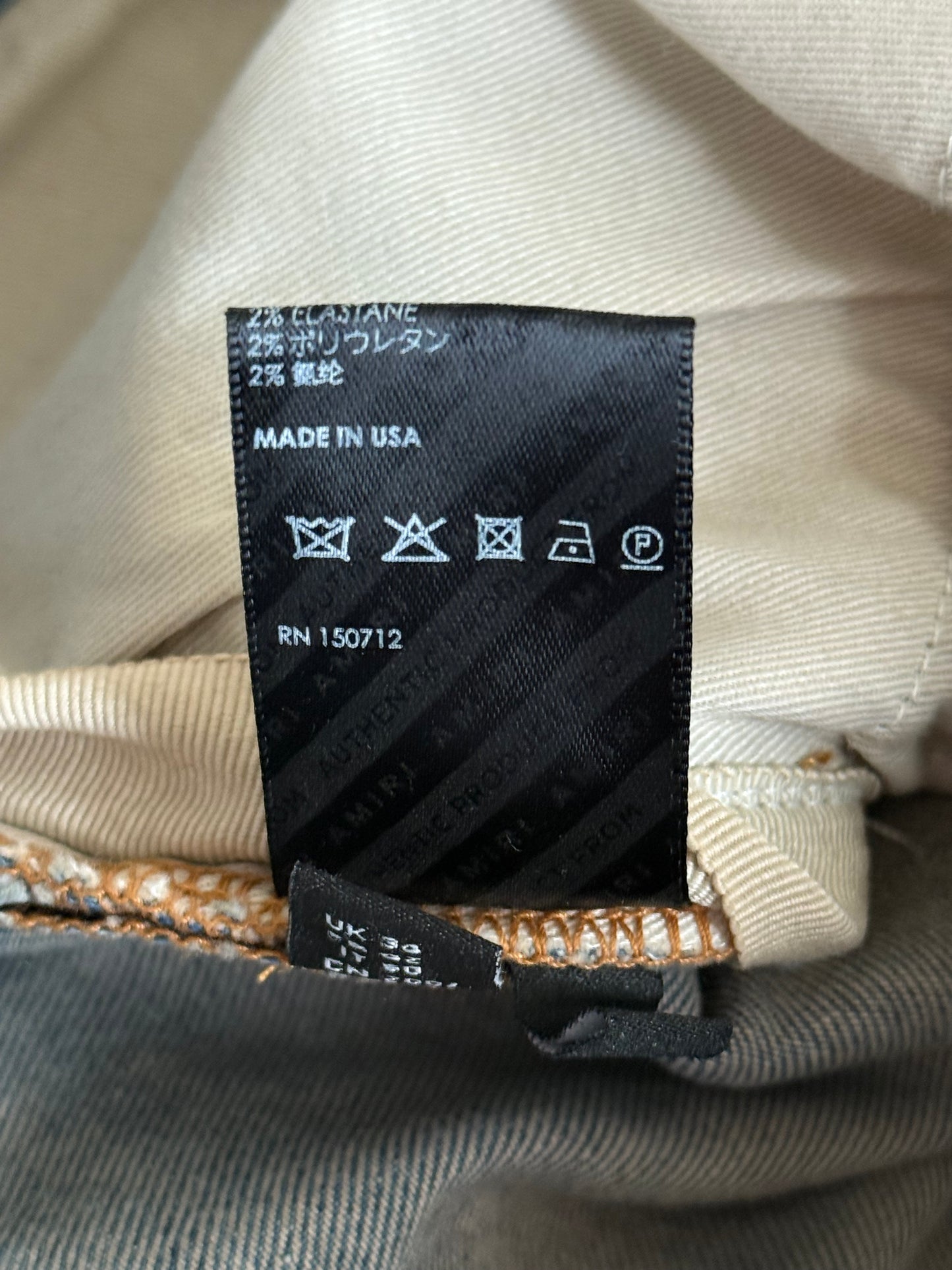 Amiri Clay Indigo Plaid Patch Thrasher Jeans