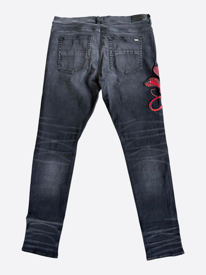 Amiri Aged Black & Red Snake Applique Thrasher Jeans