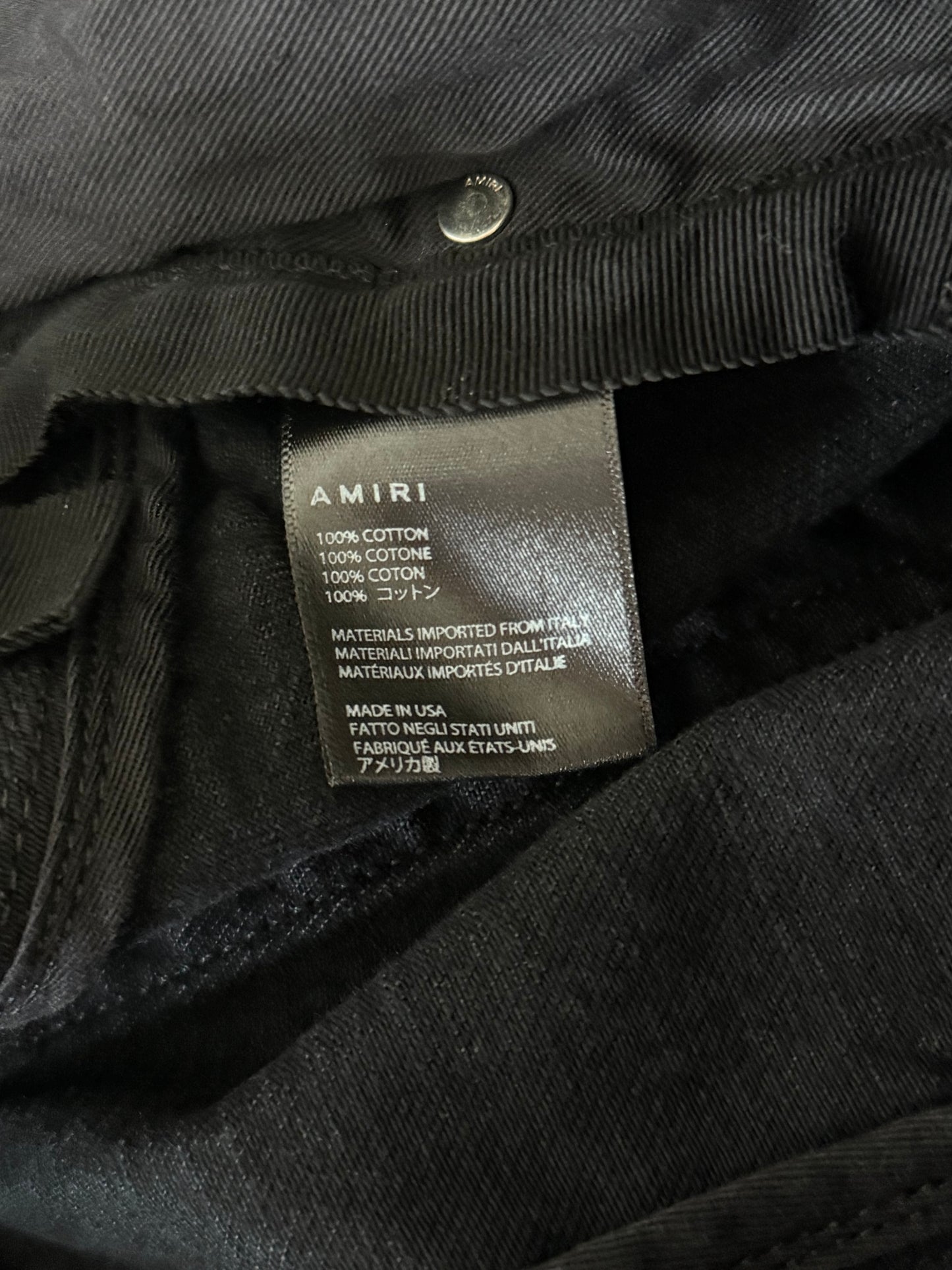 Amiri Aged Black Paint Splatter Bermuda Shorts