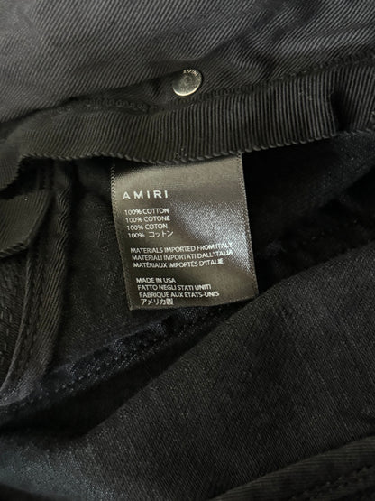 Amiri Aged Black Paint Splatter Bermuda Shorts