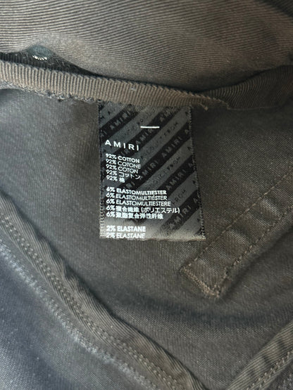 Amiri Aged Black Paint Drip MA Logo Jeans