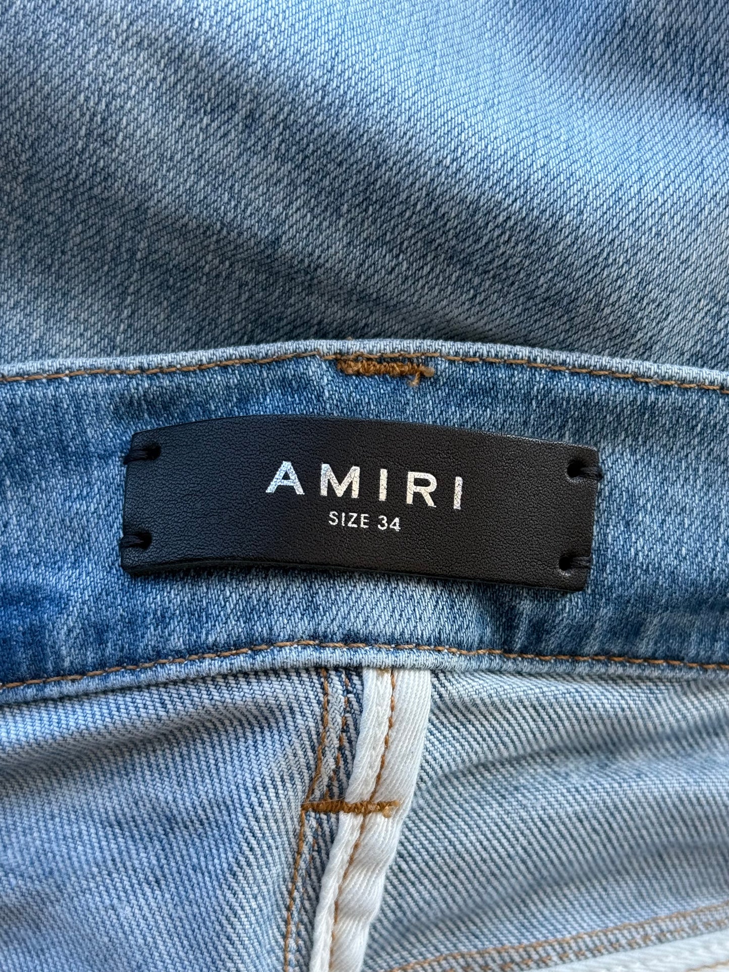 Amiri Perfect Indigo & White Serif Logo Distressed Jeans